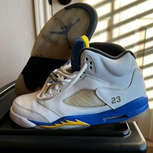 Air Jordan Retro Laney 5s. Size: 7Y which is an 8.5 in Women and 7 in Men.